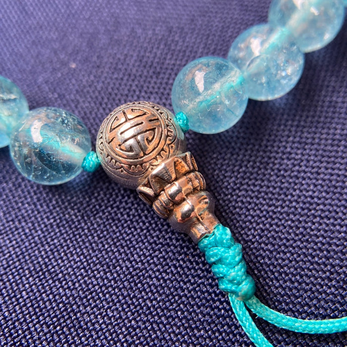 Mala de 21 cuentas de aguamarina de 8 mm con Guru Bead Plateada.