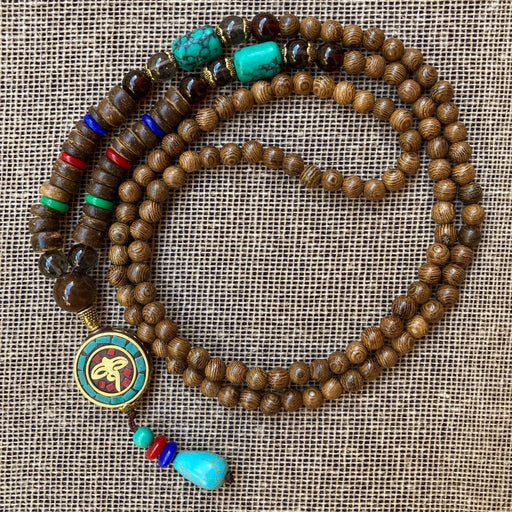 Collar tradicional tibetano con dije de Ojos de Buda - NALANDA | Tu motor de búsqueda interna