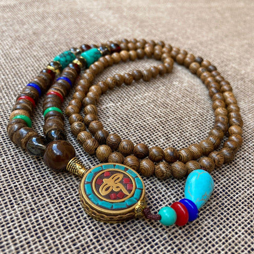 Collar tradicional tibetano con dije de Ojos de Buda - NALANDA | Tu motor de búsqueda interna