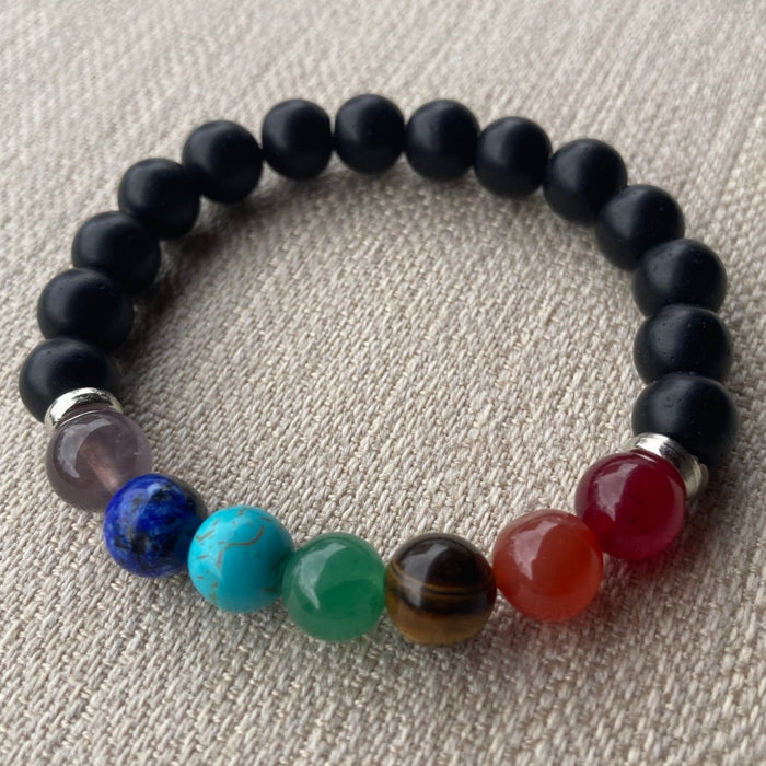 Pulsera De Onix Mate y con cuentas de chakra de 8 mm