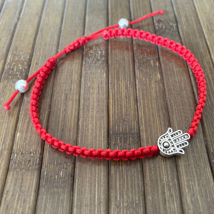 Lucky Bracelet/Pulsera de Protección con tejido panza de víbora Rojo y dije de Hamsa, San Benito o Nudo de Bruja