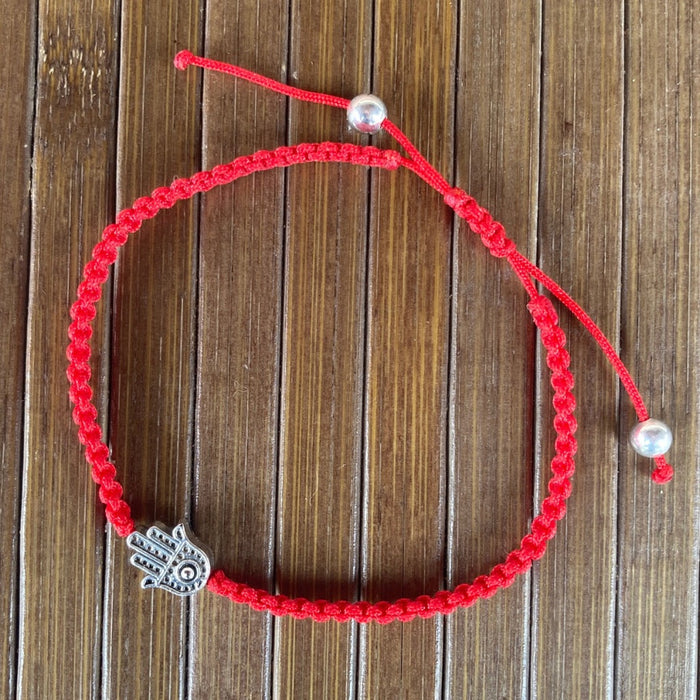 Lucky Bracelet/Pulsera de Protección con tejido panza de víbora Rojo y dije de Hamsa, San Benito o Nudo de Bruja