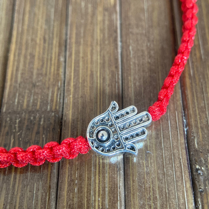 Lucky Bracelet/Pulsera de Protección con tejido panza de víbora Rojo y dije de Hamsa, San Benito o Nudo de Bruja