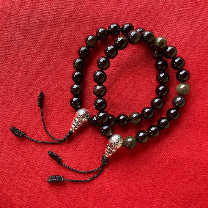 Mala de 21 cuentas de Obsidiana de 8mm con Guru Bead plateada, ajustable