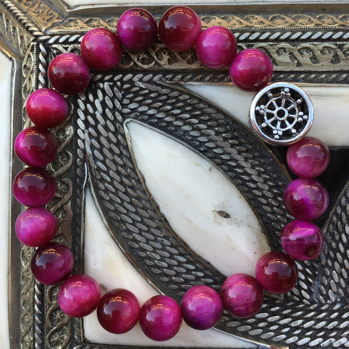 Pulsera de ojo de tigre color magenta de 8 mm - NALANDA | Tu motor de búsqueda interna